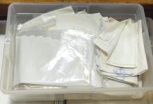 THREE BINS OF TABLE LINENS