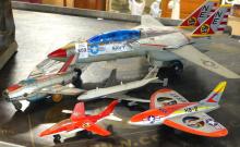 FIVE METAL AIRPLANE TOYS