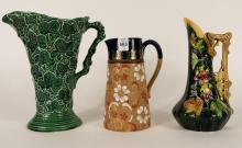 THREE POTTERY PITCHERS