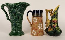THREE POTTERY PITCHERS