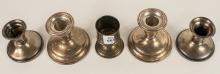 FIVE STERLING CANDLEHOLDERS