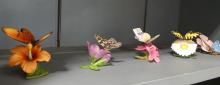 NINE BISQUE PORCELAIN "BUTTERFLY" FIGURINES