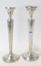 TWO STERLING CANDLESTICKS