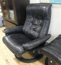 STRESSLESS BLACK LEATHER RECLINER AND FOOTSTOOL