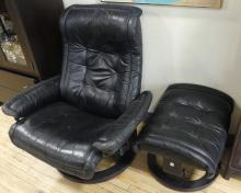 STRESSLESS BLACK LEATHER RECLINER AND FOOTSTOOL