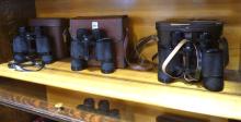 SIX SETS OF BINOCULARS