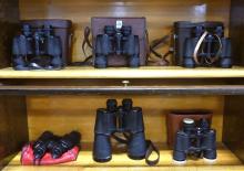 SIX SETS OF BINOCULARS