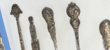 TWELVE STERLING SOUVENIR SPOONS