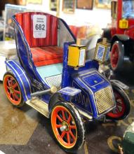 FOUR TIN TOYS