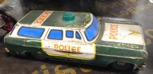 FOUR TIN TOYS