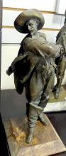 PAIR OF SPELTER CAVALIER SCULPTURES