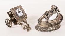 TWO FIGURAL NAPKIN RINGS