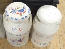 TWO PAINTED MILK CANS