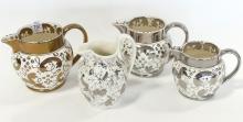 FOUR WEDGWOOD POTTERY PITCHERS