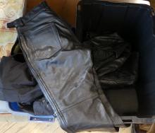 TWO BINS OF MOTORCYCLE CLOTHING, ETC.
