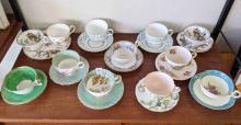 ELEVEN AYNSLEY CUPS AND SAUCERS