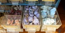 FOUR CASES OF MINERAL STONES