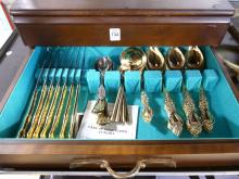 GOLD-PLATED FLATWARE IN CANTEEN