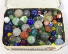 TIN OF MARBLES
