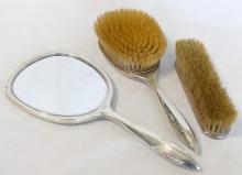 STERLING AND TORTOISESHELL BRUSHES AND MIRROR