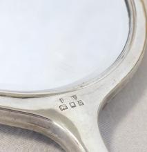 STERLING AND TORTOISESHELL BRUSHES AND MIRROR