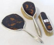 STERLING AND TORTOISESHELL BRUSHES AND MIRROR