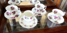 EIGHT ENGLISH CUPS AND SAUCERS