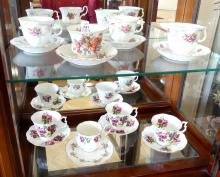 EIGHT ENGLISH CUPS AND SAUCERS