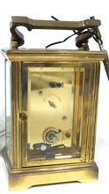 CARRIAGE CLOCK AND CANDLESTICKS