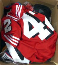 BIN AND BOX OF SPORTS JERSEYS, ETC.