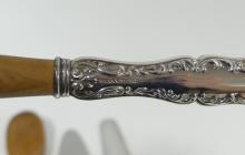 SIX SILVER HANDLE SERVERS