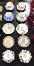 TEN ANTIQUE CUPS AND SAUCERS
