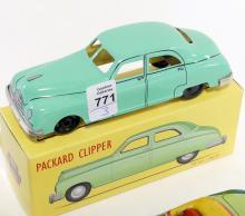 THREE TIN TOY CARS