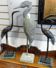 THREE CRANE SCULPTURES