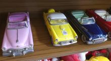 FIVE JAPANESE FRICTION TOY CARS