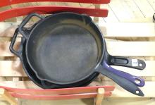 FIVE CAST IRON FRYING PANS AND CHILD'S SLED