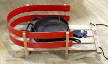 FIVE CAST IRON FRYING PANS AND CHILD'S SLED