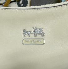 THREE COACH PURSES