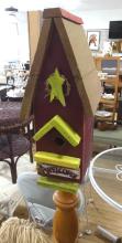 TWO WOODEN BIRDHOUSE STANDS