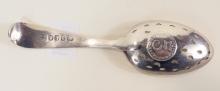 GEORGIAN STERLING TEA STRAINER AND SUGAR TONGS