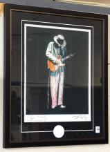 TWO FRAMED "MUSIC ARTIST" PRINTS