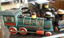 TWO VINTAGE JAPANESE TIN TRAIN TOYS