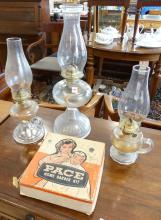 THREE OIL LAMPS AND BARBER KIT