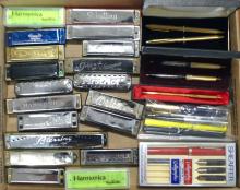 HARMONICAS AND PENS