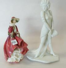 TWO FIGURINES