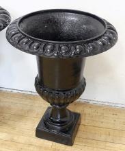 PAIR OF CAST IRON GARDEN URNS