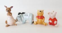 FOUR BESWICK "WINNIE THE POOH" FIGURINES