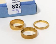 THREE 18KT GOLD BANDS