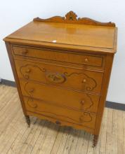 FIGURED MAPLE CHEST OF DRAWERS