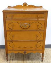 FIGURED MAPLE CHEST OF DRAWERS